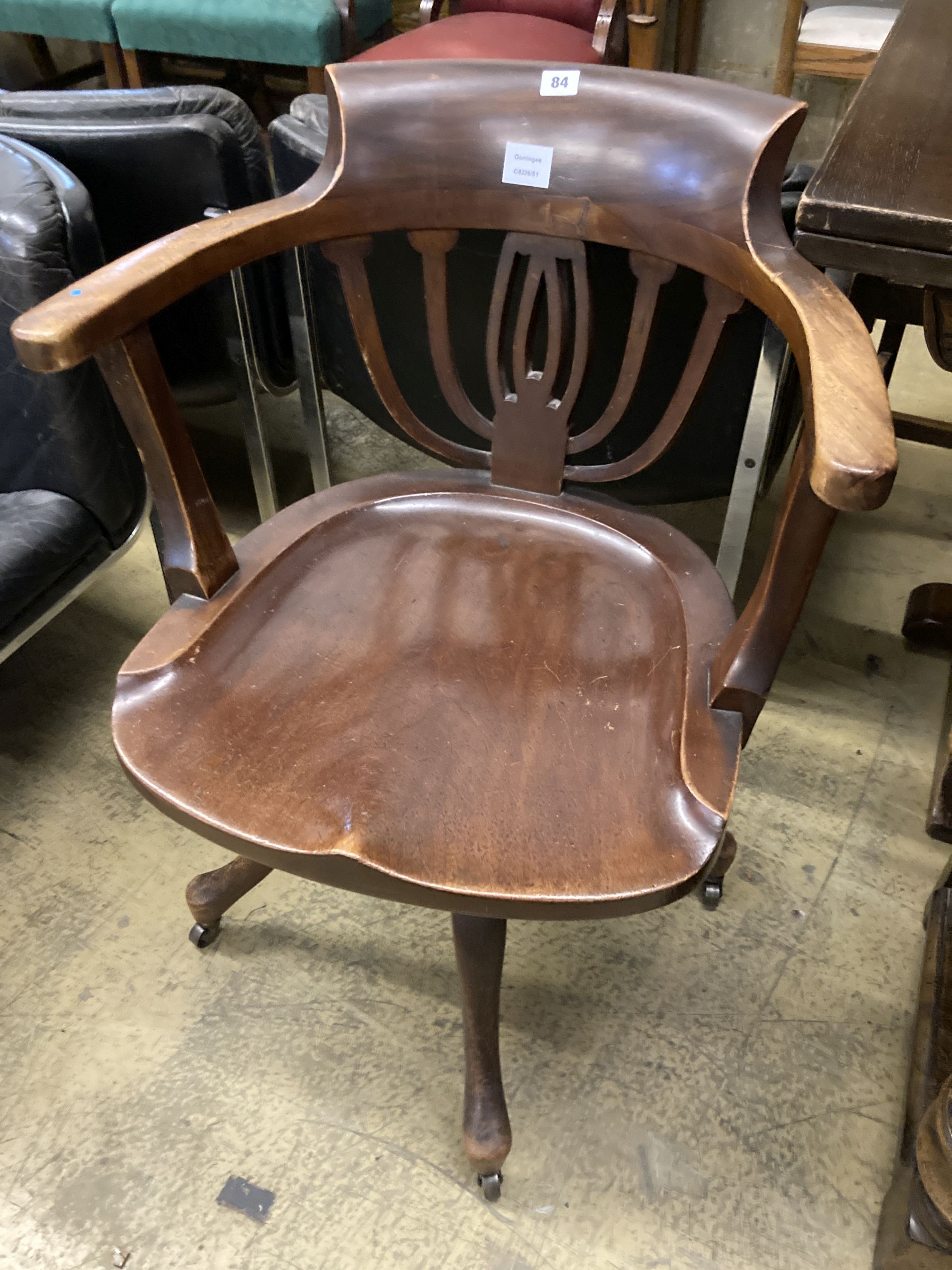 A Victorian mahogany swivel desk chair, width 60cm, depth 50cm, height 82cm